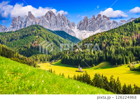 Val di Funes, Dolomites - Odle Ridge and Santa Maddalena village and iconic church. Val di Funes, Dolomites - Odle Ridge and Santa Maddalena village and iconic church. 126224968
