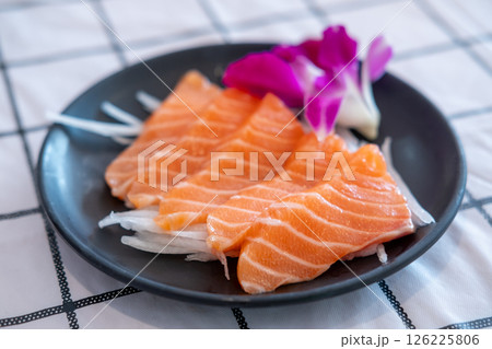 Salmon sashimi on plate, served in a restaurant Salmon sashimi on plate, served in a restaurant 126225806