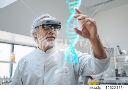 Male scientist wearing an AR headset interacting with a holographic DNA structure. The male scientist explores a 3D DNA structure, demonstrating the integration of AR in science. 126225834