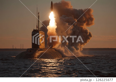 Nuclear war. Launch of a nuclear ballistic intercontinental missile from submarine. An intercontinental nuclear missile launches from the submarine, signaling potential global conflict. 126225877
