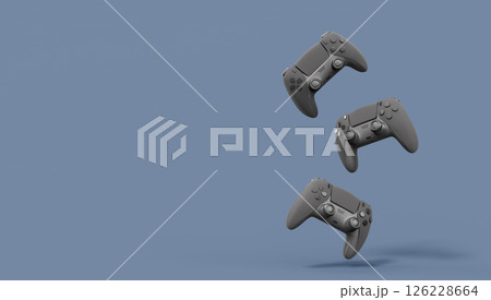 Realistic black video game joysticks or gamepads on black background 126228664