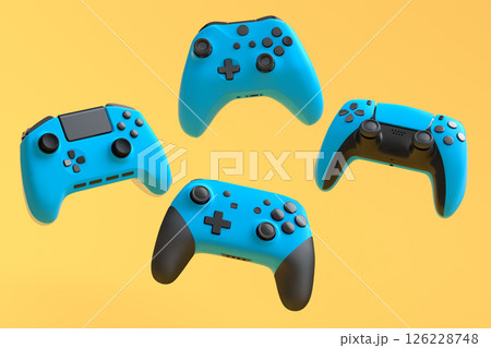 Set of flying gamer joysticks or gamepads on yellow background 126228748