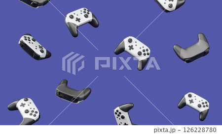 Realistic video game joysticks or gamepads rotating and falling on violet Realistic video game joysticks or gamepads rotating and falling on violet 126228780