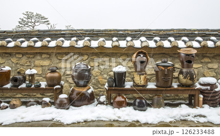 Jars under the walls of traditional Korean houses. Jars under the walls of traditional Korean houses. 126233488