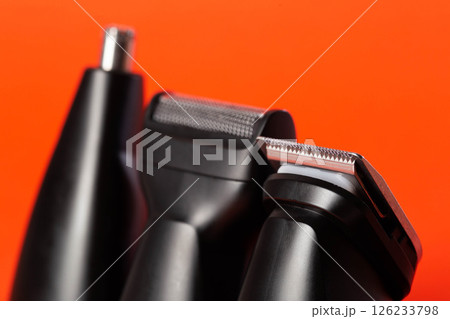 Set of trimmer and trimmer attachments for beards, sideburns and mustache trims, close-up Set of trimmer and trimmer attachments for beards, sideburns and mustache trims, close-up 126233798