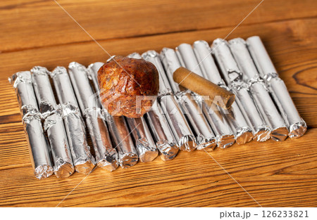 Rectal propolis suppository for eliminating edema and microbes in urology during the treatment of prostatitis, close-up 126233821