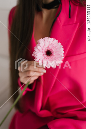 Pink Flower In Woman's Hand 126235111