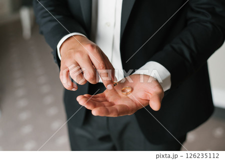 Groom Showing Wedding Rings Before Ceremony 126235112