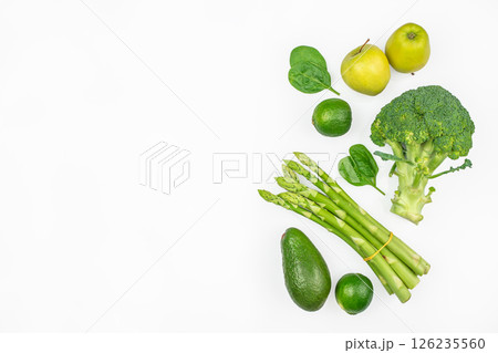 healthy organic food green vegetables and herbs. Source of protein for vegetarians on white background. top view, space for text 126235560