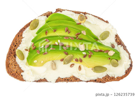 Healthy vegetarian avocado toast with rye bread and pumpkin seeds isolated on white background. Top view Healthy vegetarian avocado toast with rye bread and pumpkin seeds isolated on white background. Top view 126235739