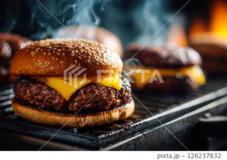 Grilled burger patty with melted cheese 126237632