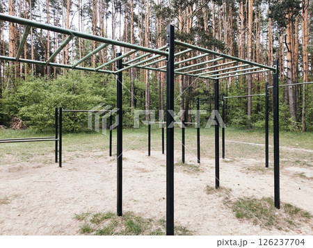 horizontal bars, outdoor sports ground for workout in the park. sports ground for workout in the park. workout area without people. horizontal bars, outdoor sports ground for workout in the park. sports ground for workout in the park. workout area without people. 126237704