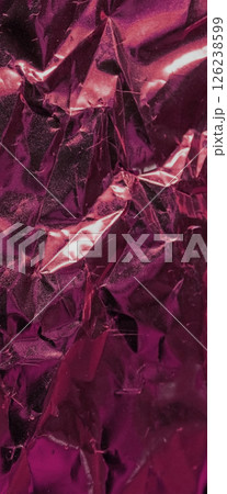 Vertical wavy metallic sheet in red tones for designer backgrounds.High resolution metallic texture 126238599