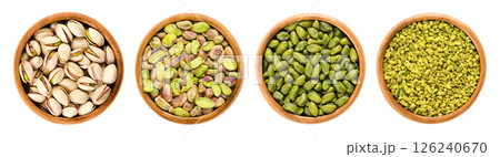 Pistachios in wooden bowls. From left to right unshelled and shelled roasted pistachios, whole and chopped raw pistachio seeds. A flavorful snack and versatile ingredient. Isolated, from above. Photo Pistachios in wooden bowls. From left to right unshelled and shelled roasted pistachios, whole and chopped raw pistachio seeds. A flavorful snack and versatile ingredient. Isolated, from above. Photo 126240670