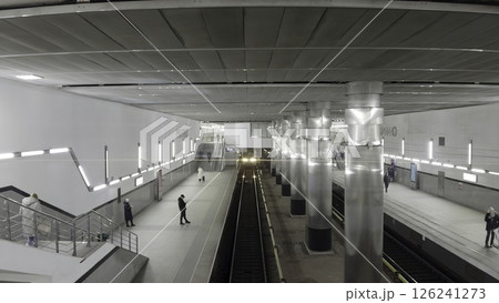 Subway train arriving at okruzhnaya station in Moscow. Action 126241273