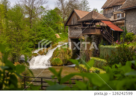 The historic village of Rastoke in the town of Slunj, where the Slunjcica River flows into the Korana River via cascades and waterfalls, Croatia 126242599