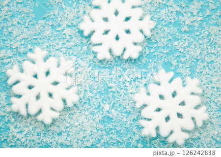 Beautiful snowflakes with snow on blue background. Beautiful snowflakes with snow on blue background. 126242838