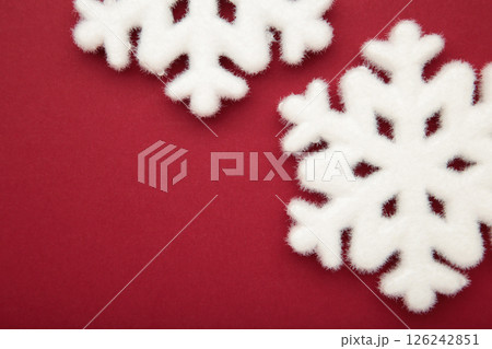 Beautiful snowflakes on red background. Space for text Beautiful snowflakes on red background. Space for text 126242851