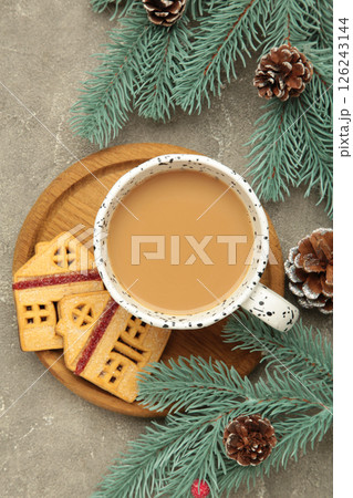 Mini cookies house on grey background. Christmas decoration. Top view 126243144