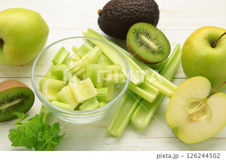 Kiwi, celery, apples from green smoothies. Detox concept, healthy food, diet, vegetarian. Smoothie on white 126244502