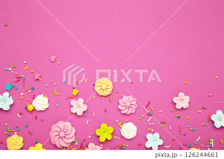 Easter sugar sprinkles for decor cake on pink background. 126244661