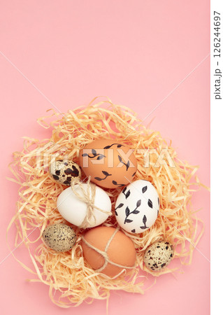 Composition with Easter eggs on pink background Composition with Easter eggs on pink background 126244697
