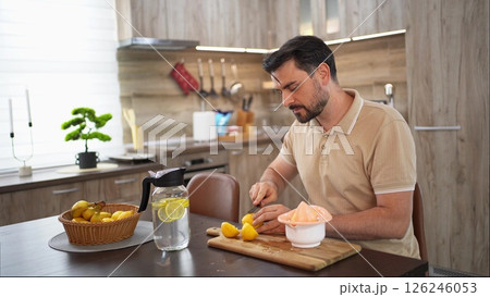 Preparing a refreshing lemon dessert in a cozy kitchen 126246053