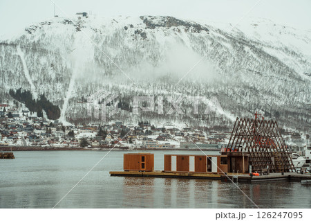 Winter harbor and cityscape of Tromso, Norway 126247095