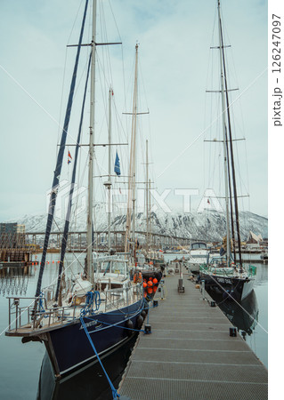 Winter harbor and cityscape of Tromso, Norway 126247097
