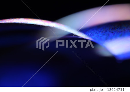 Deep purple liquid surface on black background, oil stains movement, bright chemistry, deep space background Deep purple liquid surface on black background, oil stains movement, bright chemistry, deep space background 126247514