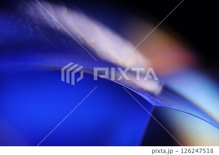 Deep purple liquid surface on black background, oil stains movement, bright chemistry, deep space background 126247518