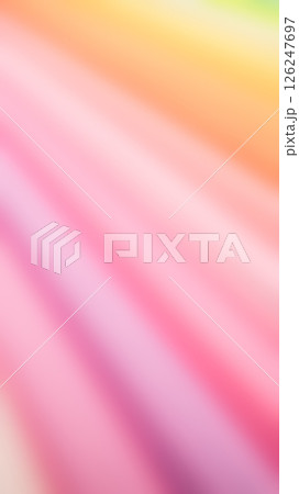 a soft, dreamy blur of pastel colors, primarily pinks, oranges, and hints of yellow and green, with diagonal movement a soft, dreamy blur of pastel colors, primarily pinks, oranges, and hints of yellow and green, with diagonal movement 126247697