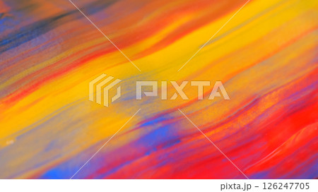 sweeping, horizontal strokes of yellow, red, orange, and hints of blue and purple, blended in a fluid and energetic pattern 126247705