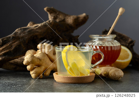 Ginger tea with lemon and honey. Ginger tea with lemon and honey. 126248025