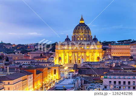 View of St. Peter's Basilica in the Vatican city in sunset, Rome, Italy. Saint Peter Basilica in Vatican City at Rome, Italy and Street Via della Conciliazione. 126248296