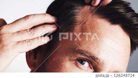 Hairline, growth and closeup with man in studio for scalp inspection, beauty and alopecia treatment. Grooming, self care and dandruff with mature person on white background for clean and texture 126248714
