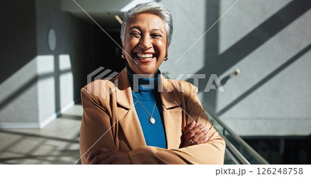 Smile, mature and confident business woman in company with experience as talent acquisition specialist. Arms crossed, professional and happy human resources manager in office in hallway in Mexico 126248758
