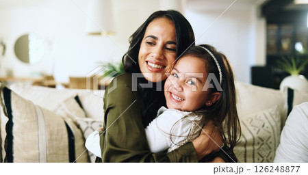 Smile, hug and love with mother and daughter on sofa for bonding, support and trust. Happiness, relax and connection with woman and girl in living room of family home for care, comfort and embrace Smile, hug and love with mother and daughter on sofa for bonding, support and trust. Happiness, relax and connection with woman and girl in living room of family home for care, comfort and embrace 126248877