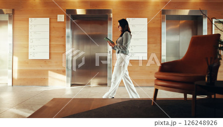 Walking, lobby and business woman on tablet for connection, internet and website news in office. Elevator, corporate workspace and person on digital tech for online report, research and networking Walking, lobby and business woman on tablet for connection, internet and website news in office. Elevator, corporate workspace and person on digital tech for online report, research and networking 126248926