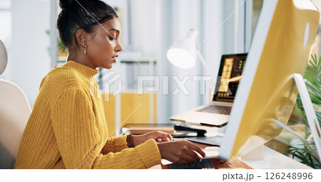 Reading, computer and research with business woman in office for creative newsletter, publication or planning. Email marketing, subscription campaign and copywriting editor with person in agency 126248996