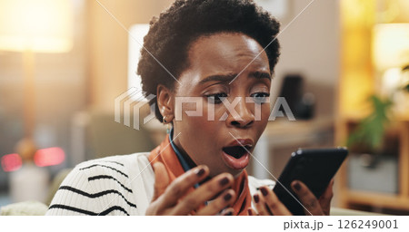 Home, surprise and black woman with smartphone, wow and email notification with online news report. Mobile user, apartment or African person with cellphone, shocked and article on war or human rights Home, surprise and black woman with smartphone, wow and email notification with online news report. Mobile user, apartment or African person with cellphone, shocked and article on war or human rights 126249001