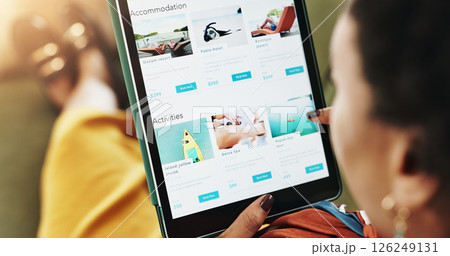 Woman, hands and sofa with tablet screen for holiday, accommodation or travel website at home. Above, female person or user with technology display or app for online booking, activities or deal 126249131