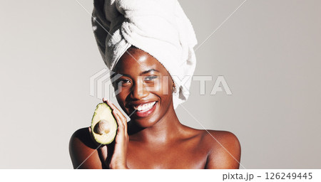 Happy, black woman and skincare portrait with avocado for omega3, wellness or detox on white studio background. Glow, beauty or African model with natural fruit for organic treatment on mockup space 126249445