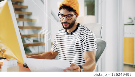 Creative designer, script or man with document in startup for artistic project, media or video editing. Paperwork, check or computer for research for content creation, post production and filmmaking 126249495