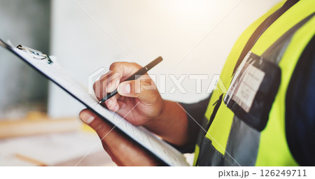 Man, hands and engineer with clipboard for inspection, industrial career and building renovation of development. Contractor, architect and construction site for maintenance or infrastructure project 126249711