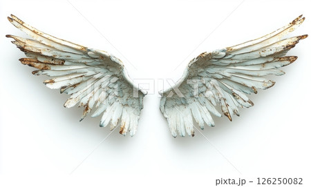 Rustic angel wings sculpture with distressed paint and weathered texture, spread open on white background symbolizing freedom, divinity and spiritual resilience 126250082