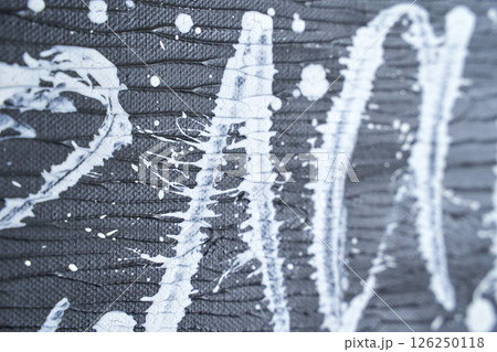 Close up of abstract black and white textured paint strokes on canvas Close up of abstract black and white textured paint strokes on canvas 126250118