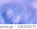 Textured blue and purple paper background with soft patterned details 126250275