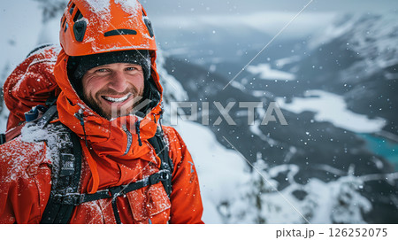portrait of a smiling man in work clothes and a hard hat. He is a lumberjack 126252075