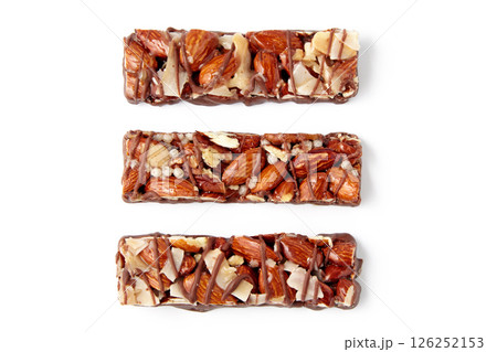 three nut caramel bars isolated on white background. top view with copy space three nut caramel bars isolated on white background. top view with copy space 126252153